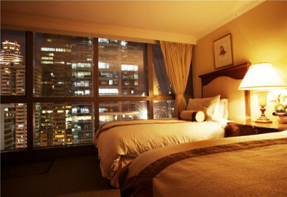 Discovery Suites Manila, Philippines Pasig City Номер фото
